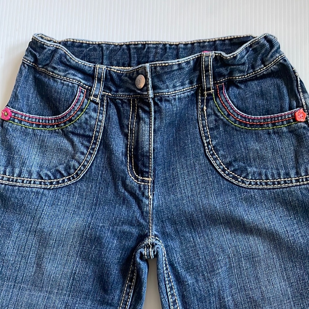 Gymboree jeans, cuffed with colored buttons & colorful threading. Girls size 10